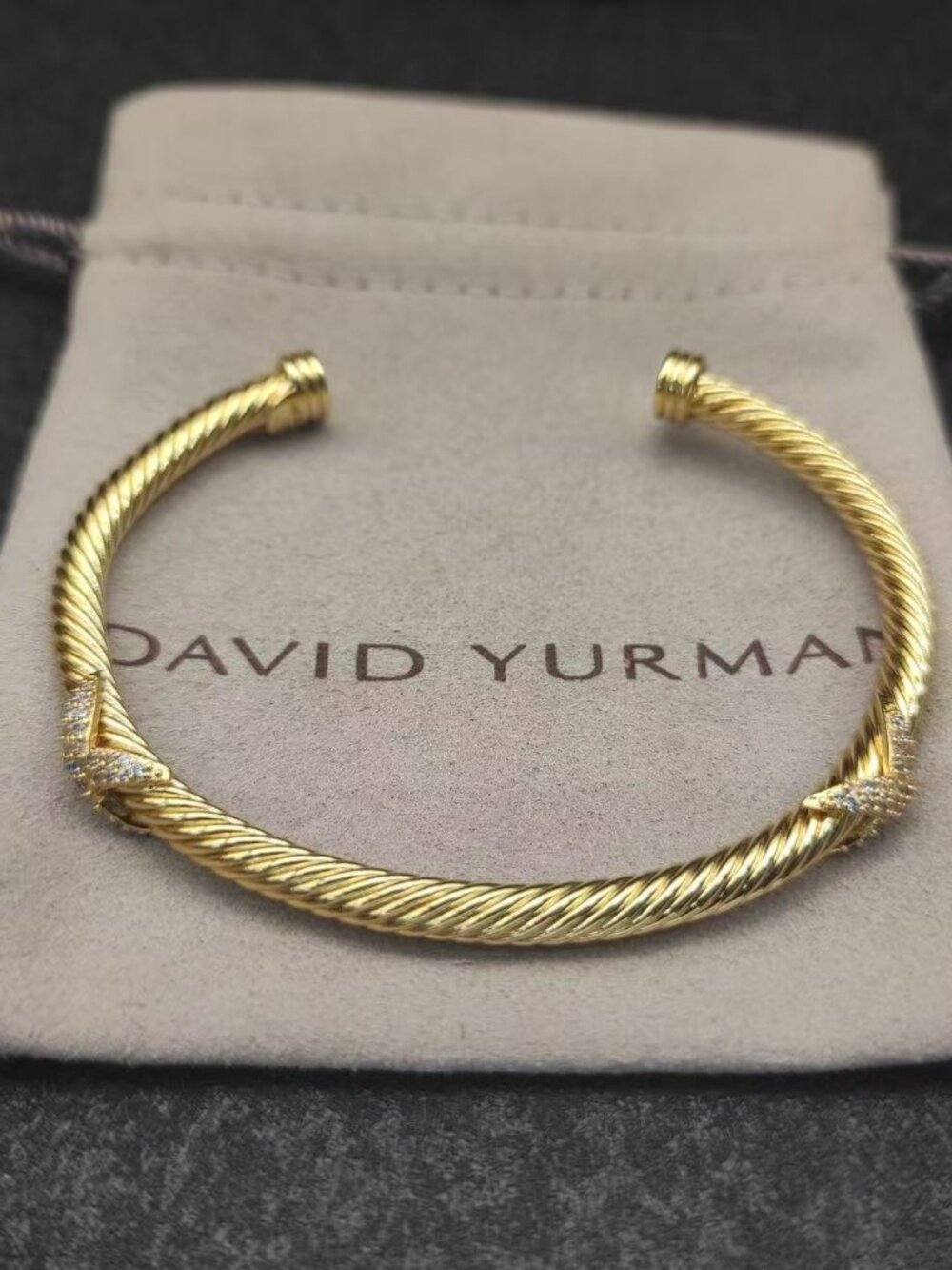 David Yurman's bracelet with a cross motif
